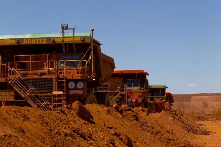 Trucks in a desert landscape